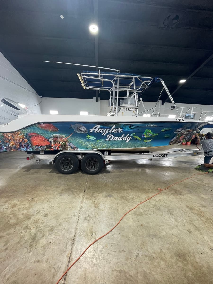 Angler Daddy boat with full coral reef wrap by ATD Suncoast