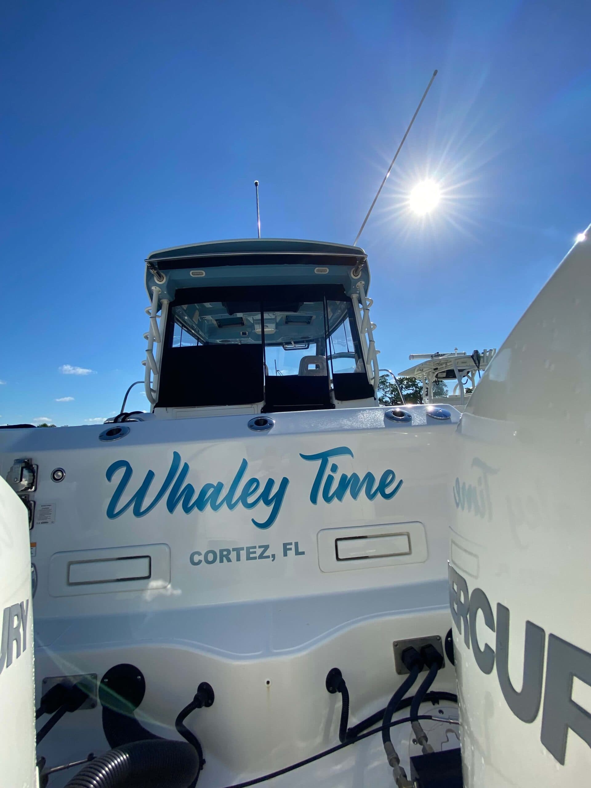 Custom boat graphics boat name lettering by Auto Trim Design Bradenton