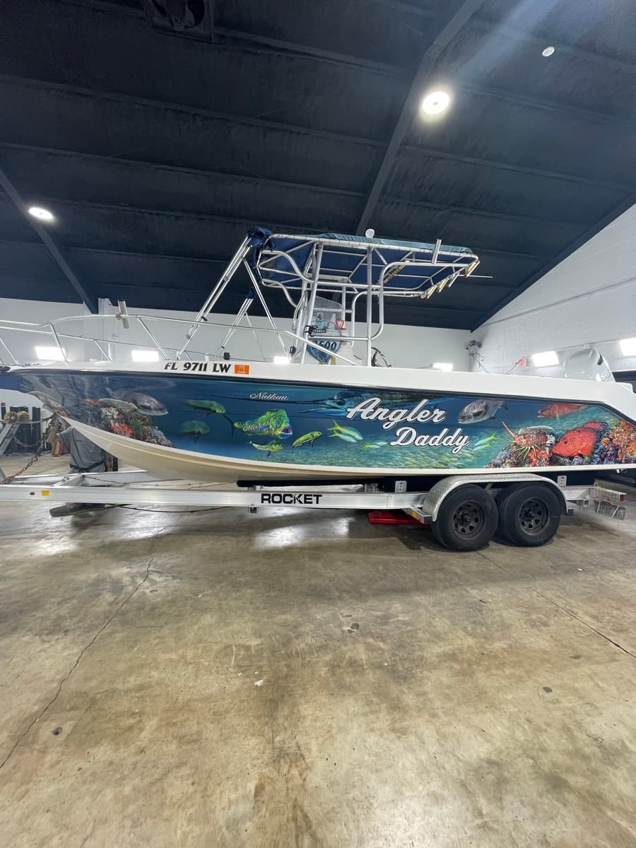 Angler Daddy boat with full coral reef wrap by ATD Suncoast