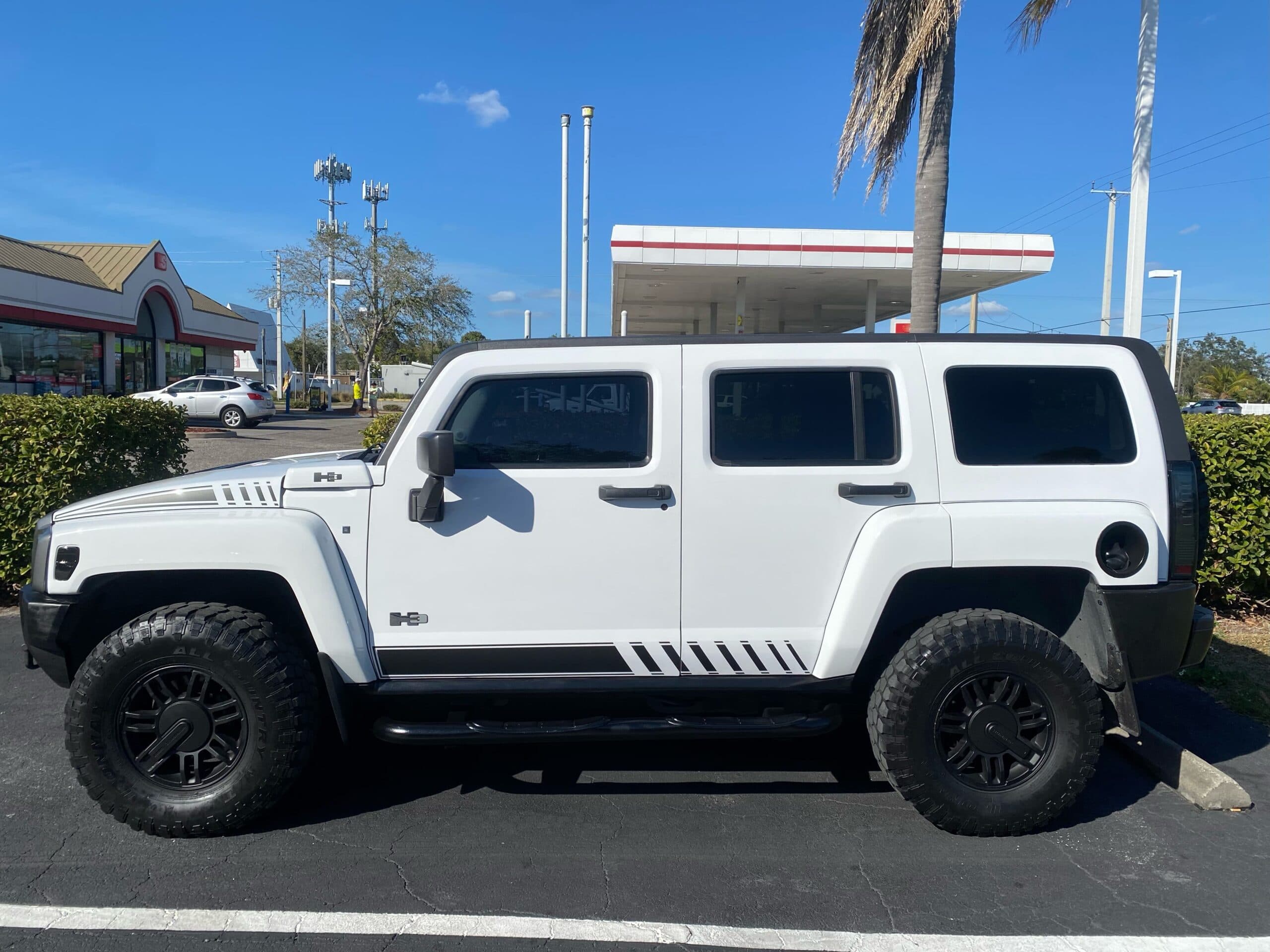 Custom vinyl graphics on custom vehicle by ATD Suncoast