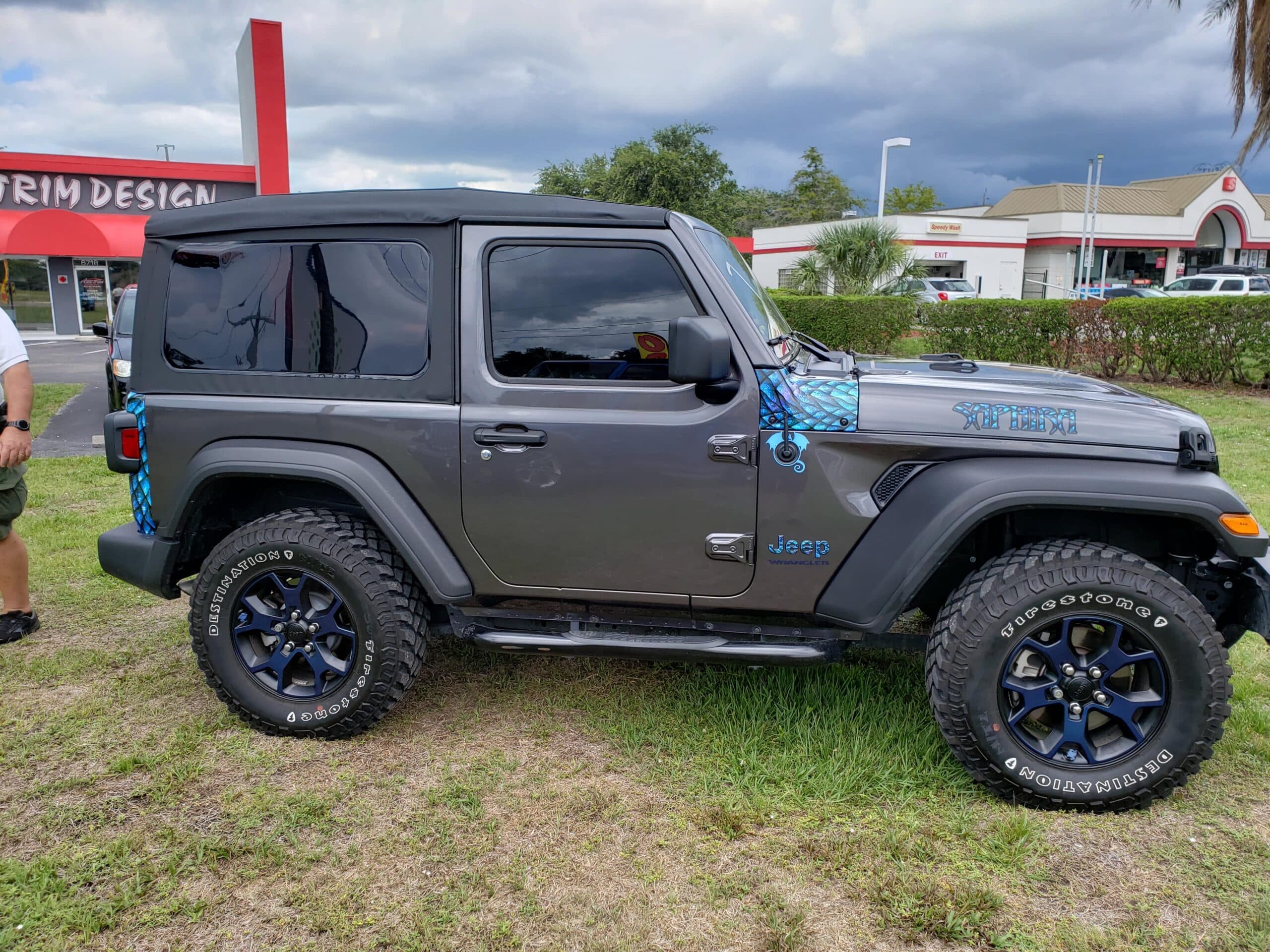 Custom vinyl graphics on custom vehicle by ATD Suncoast