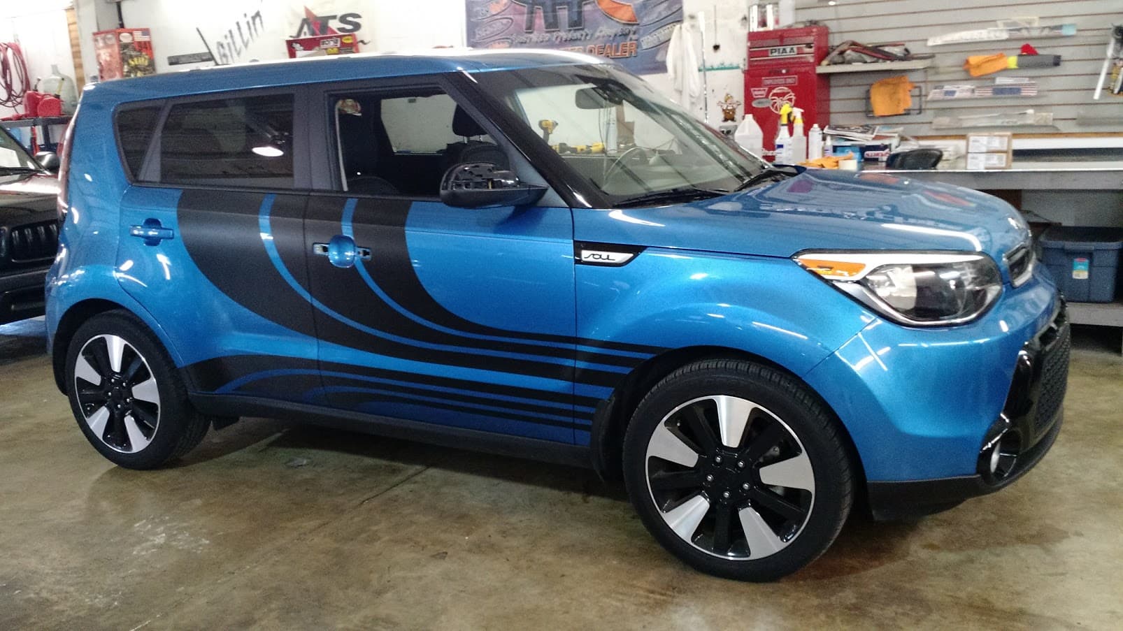 Custom vinyl graphics on custom vehicle by ATD Suncoast