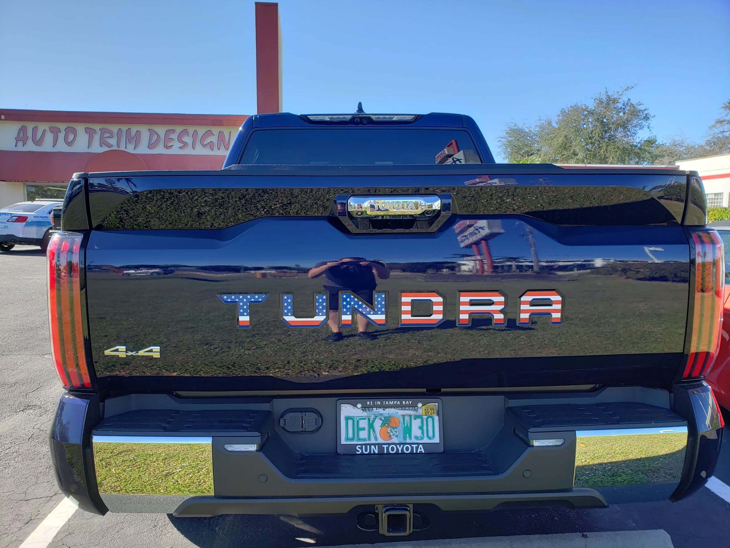Custom vinyl graphics on custom vehicle by ATD Suncoast