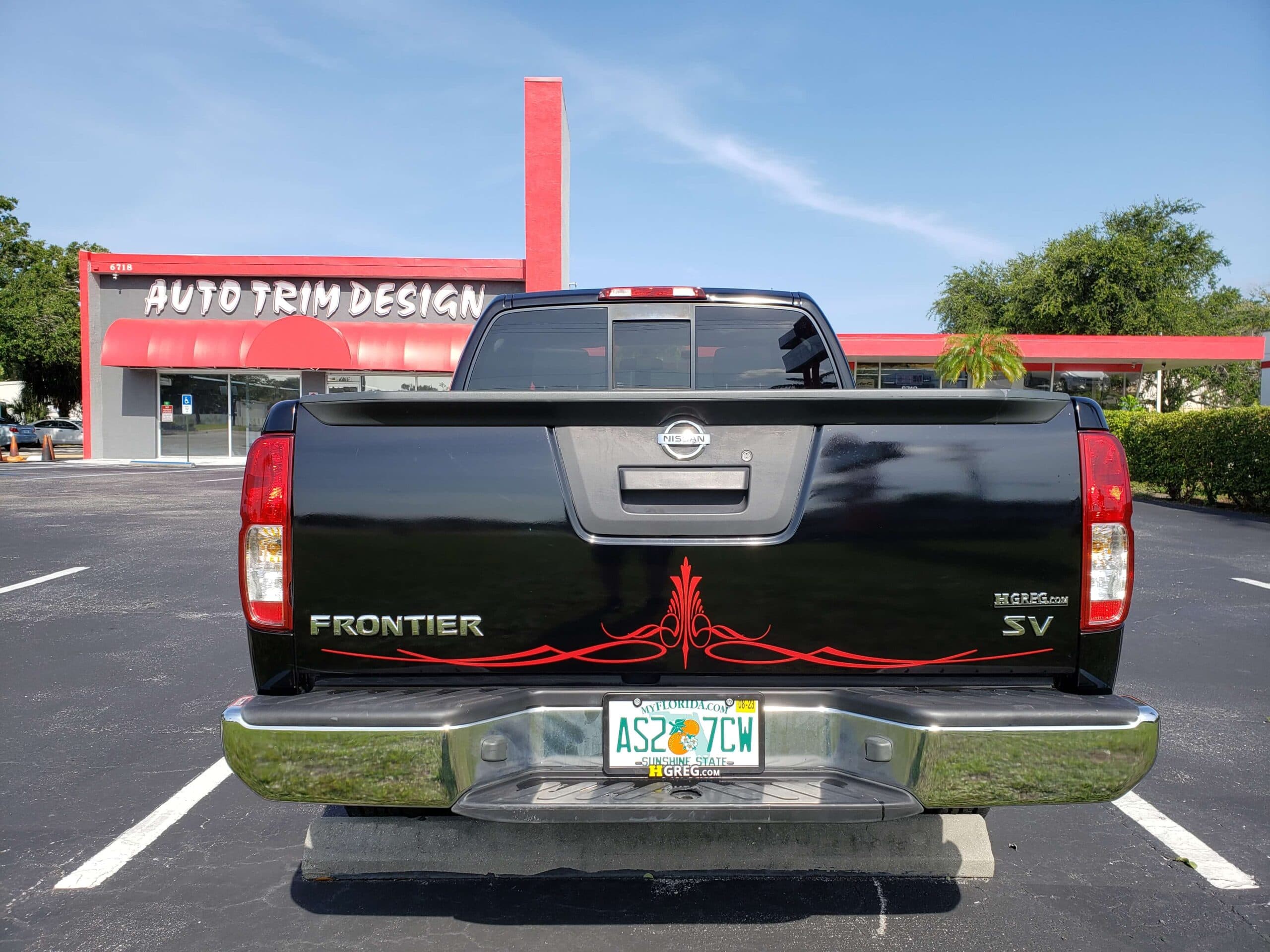 Custom vinyl graphics on custom vehicle by ATD Suncoast