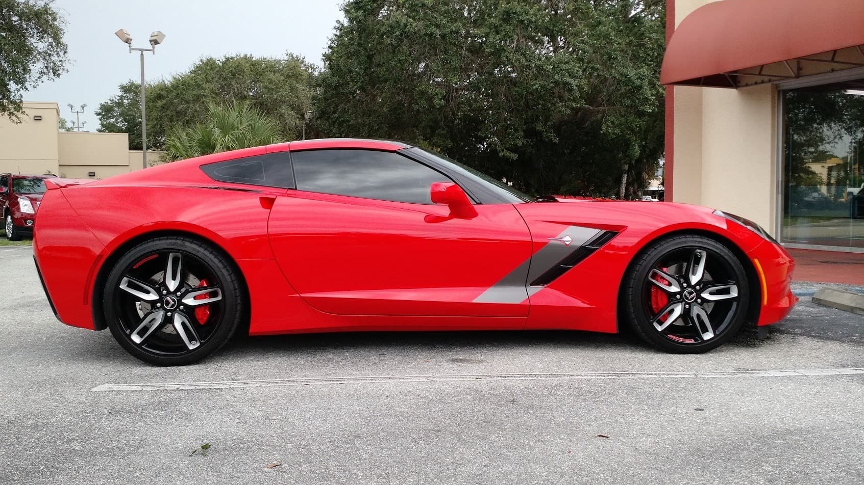 Custom vinyl graphics on custom vehicle by ATD Suncoast