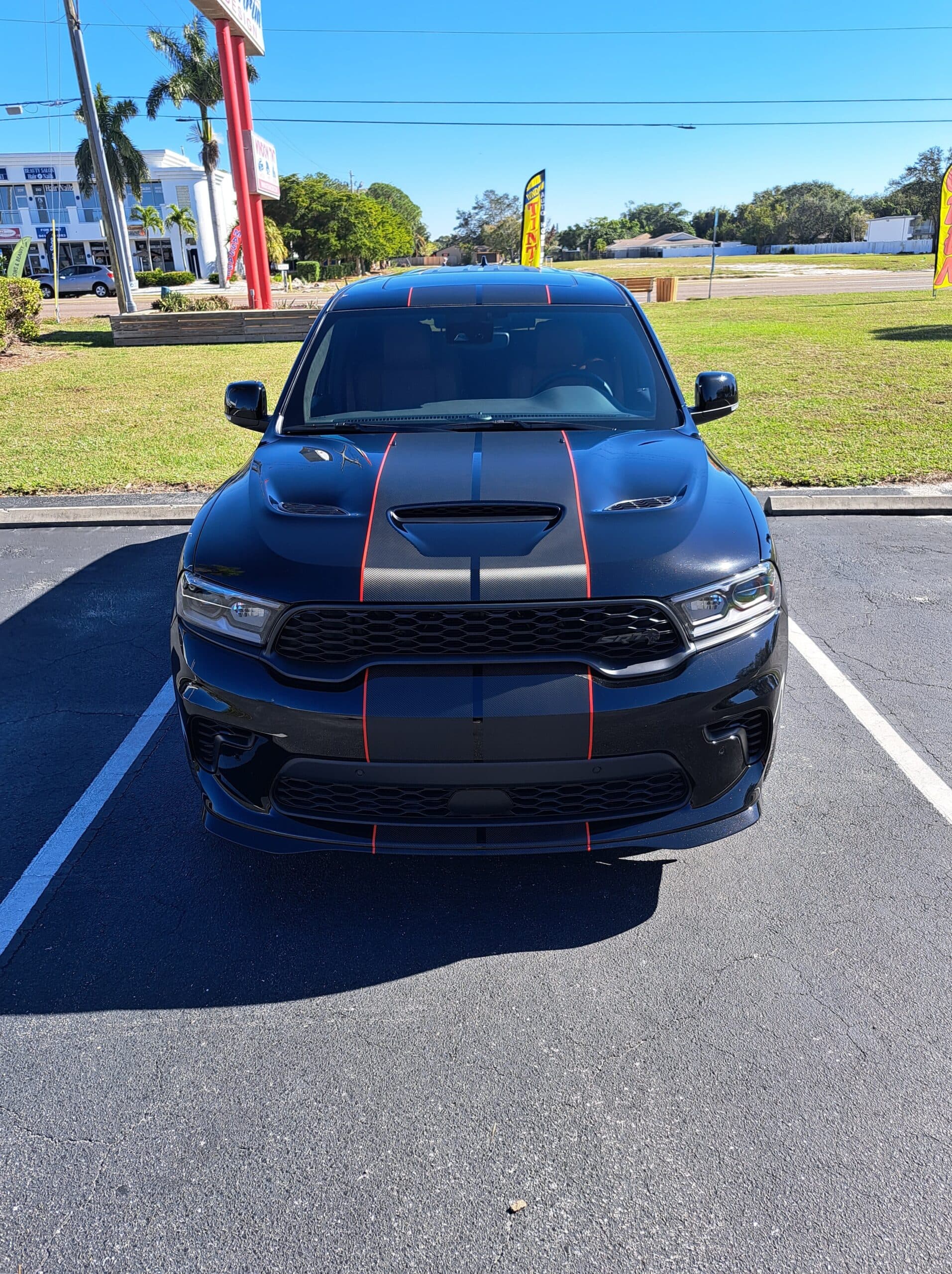 Custom vinyl graphics on custom vehicle by ATD Suncoast