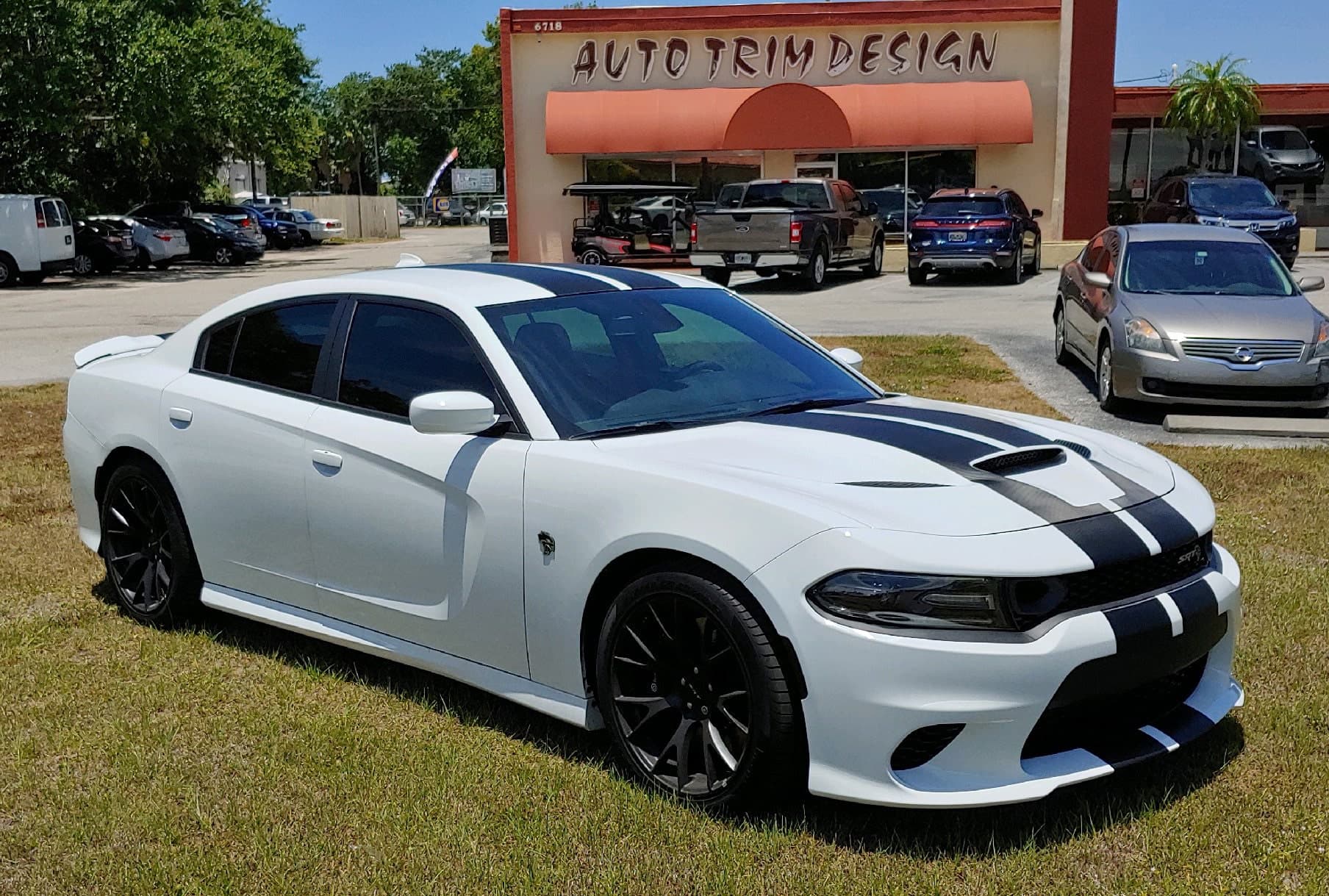 Custom vinyl graphics on custom vehicle by ATD Suncoast