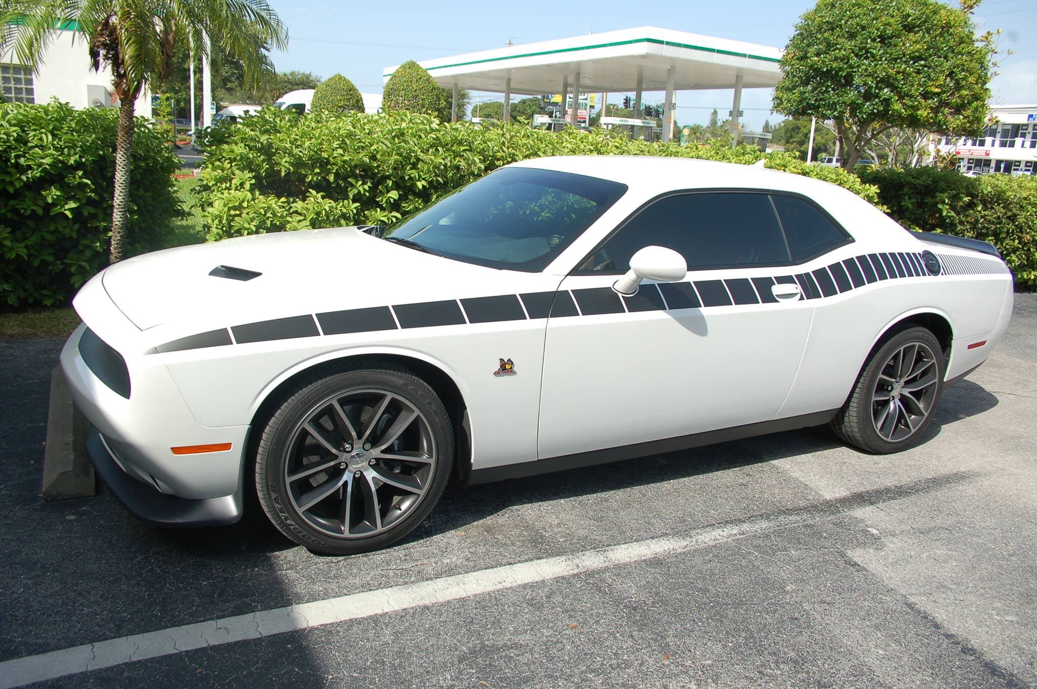 Custom vinyl graphics on custom vehicle by ATD Suncoast