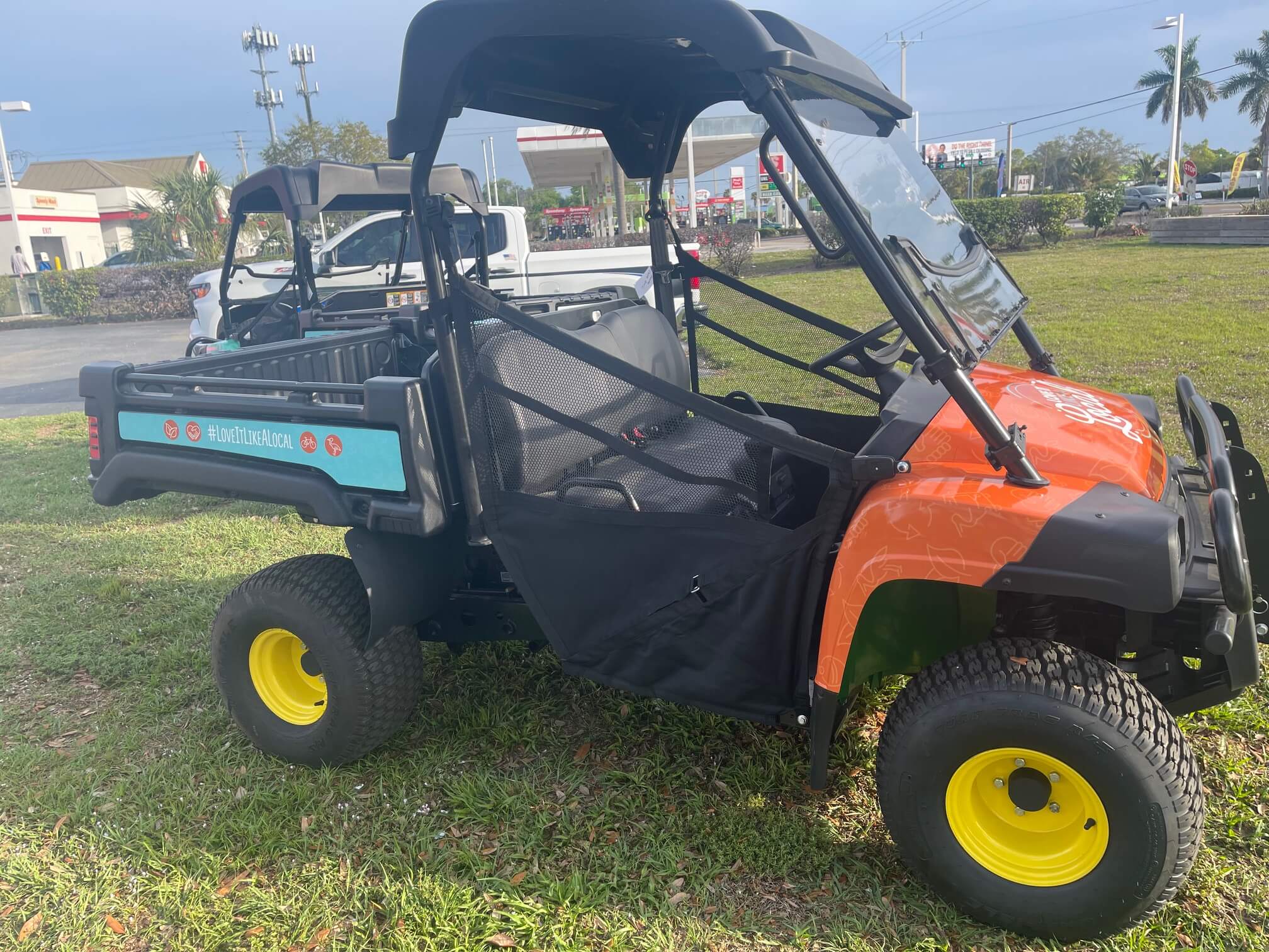 Custom golf cart graphics detail work by ATD Suncoast