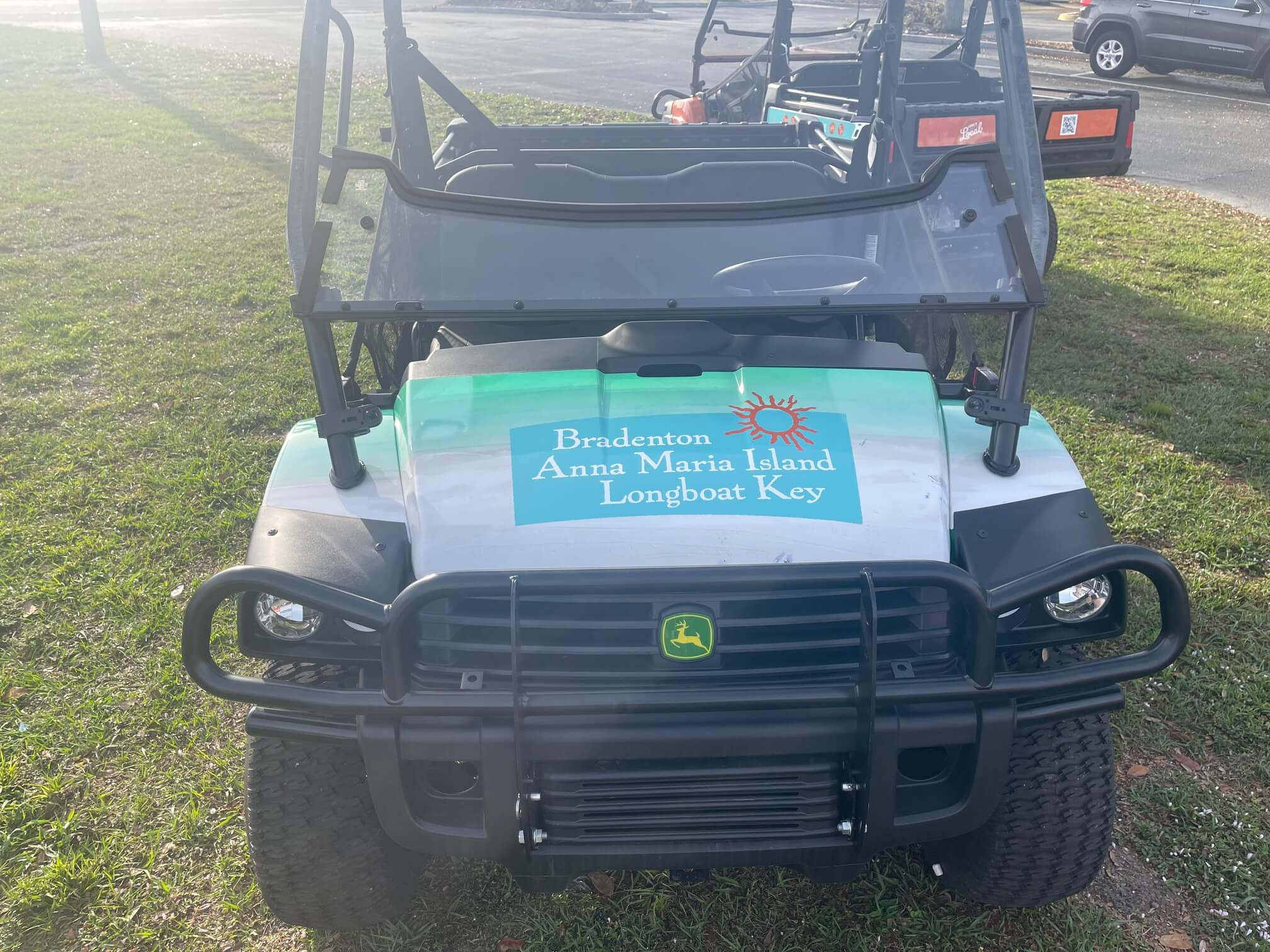 Custom golf cart graphics detail work by ATD Suncoast