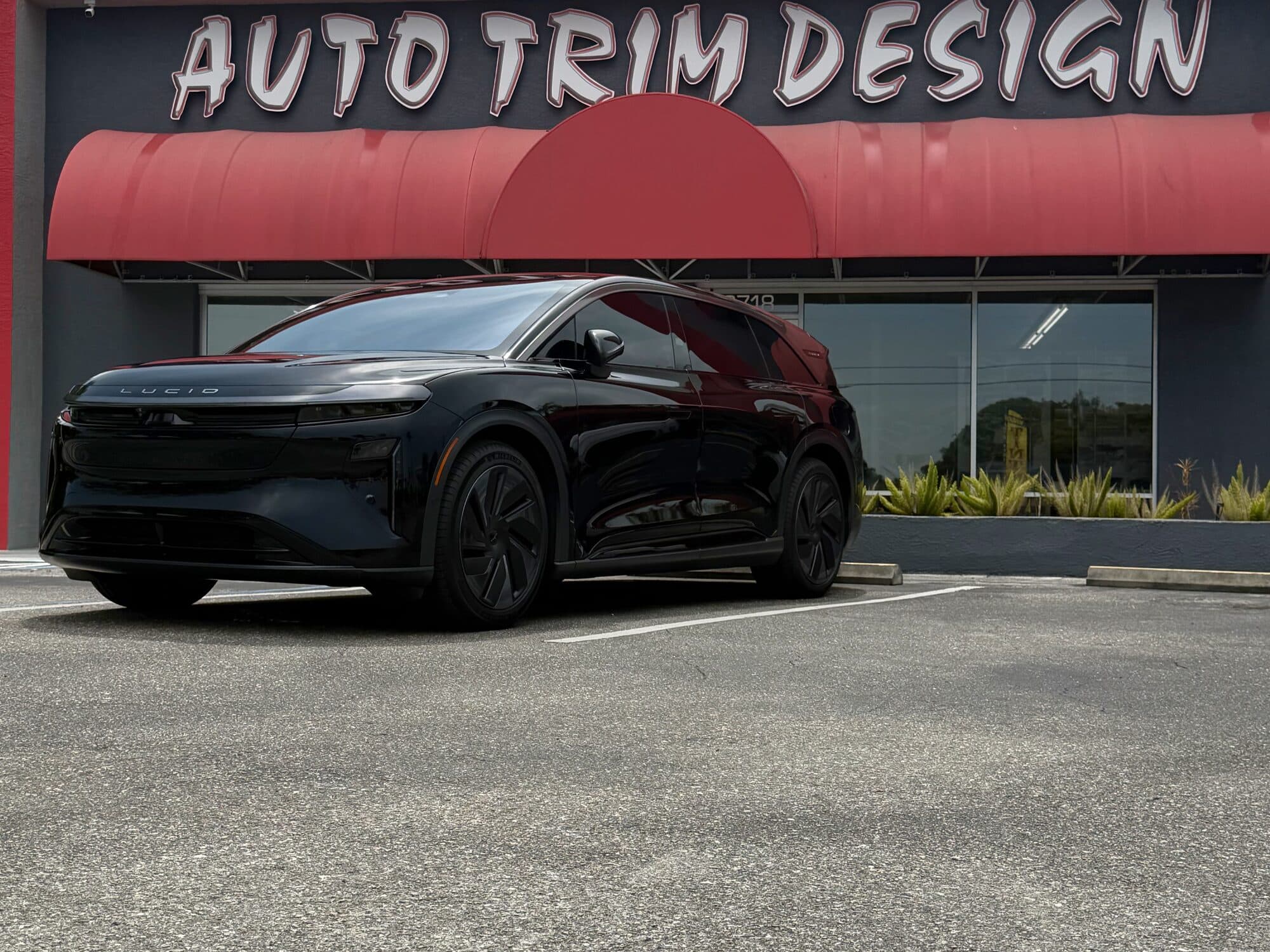 Black Lucid Gravity SUV with window tint by ATD Suncoast