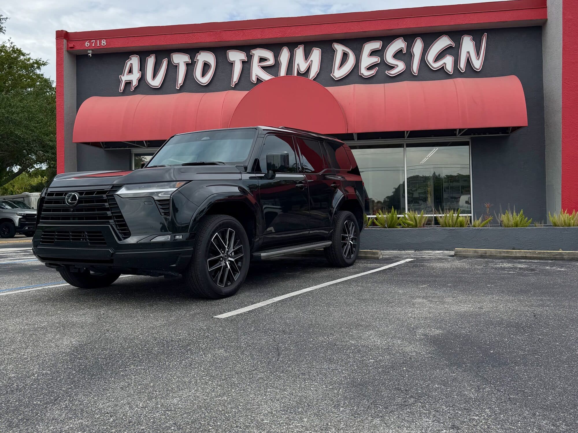 Black Lexus GX with professional window tint by Auto Trim Design